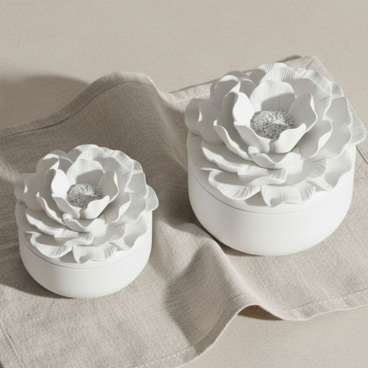Small and large Camelia jar and lid with a natural finish