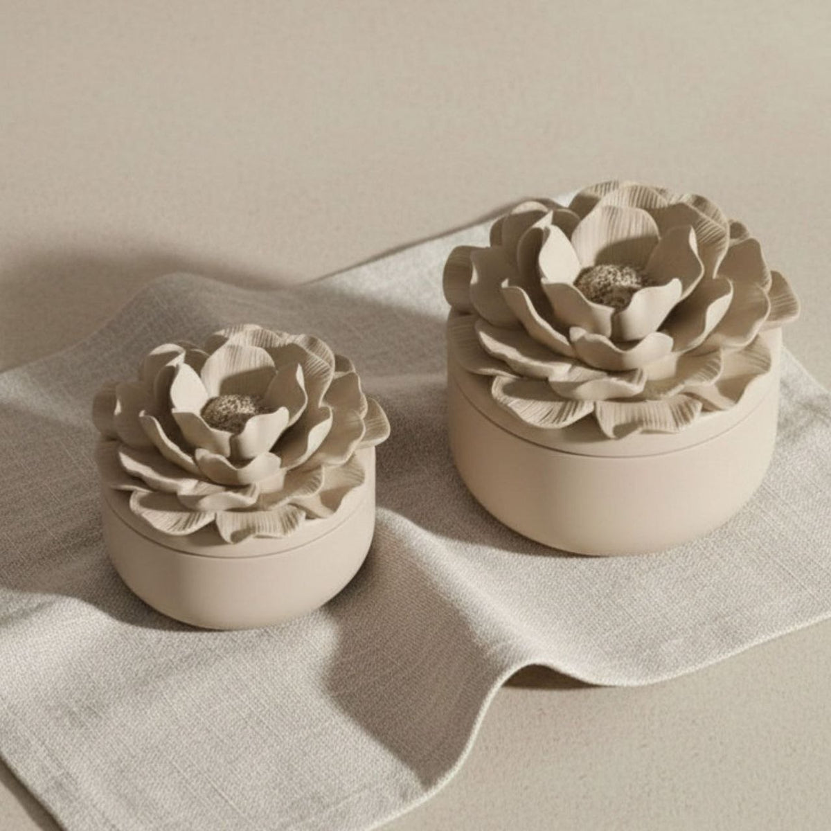 Small and large Camelia jar and lid with a taupe finish