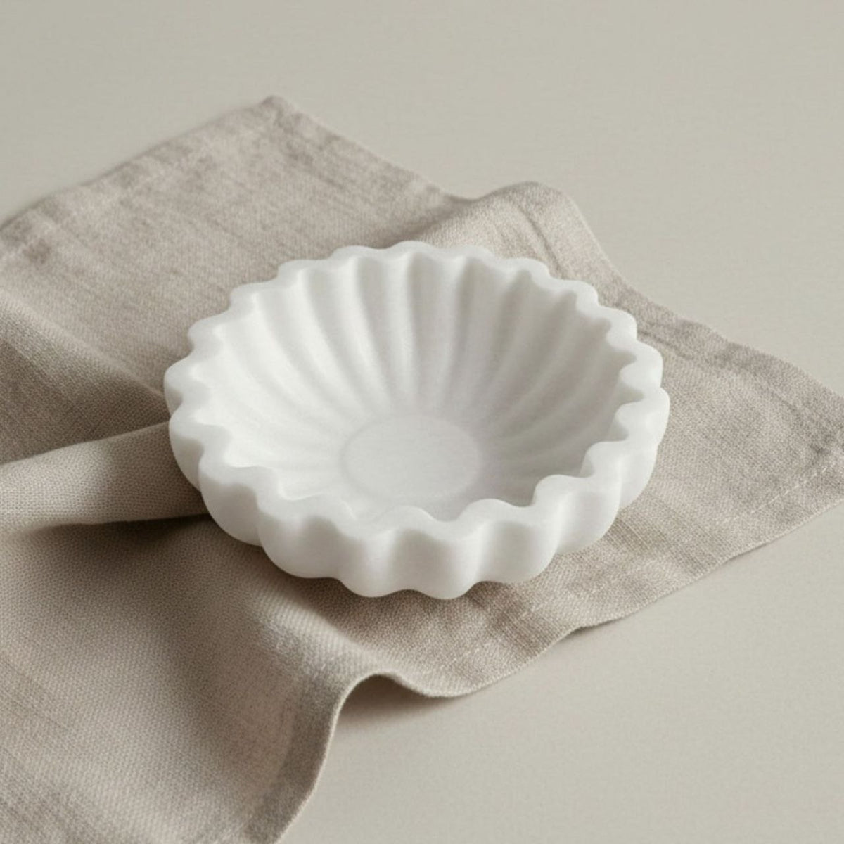Fluted ribbed bowl on linen