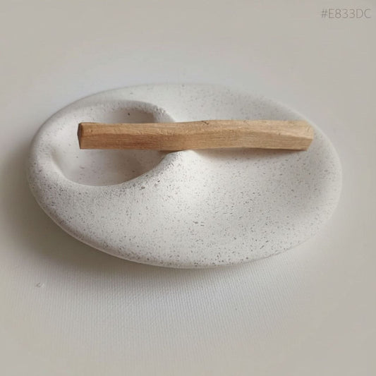 Palo Santo tray with textured surface on a beige background