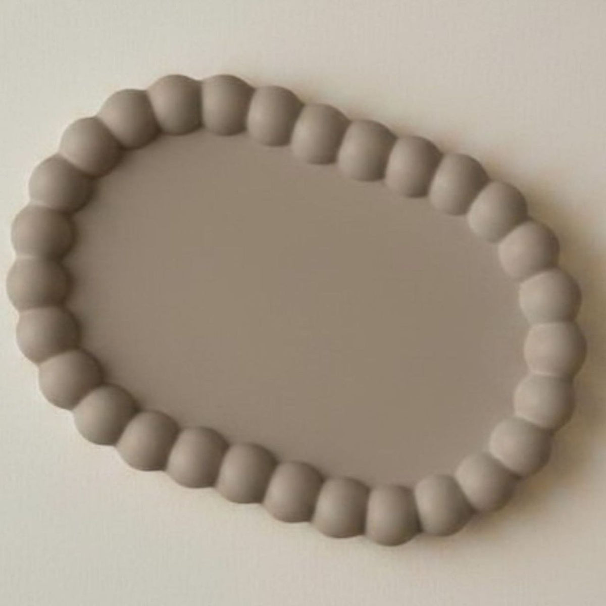 Oval bubble tray in taupe finish