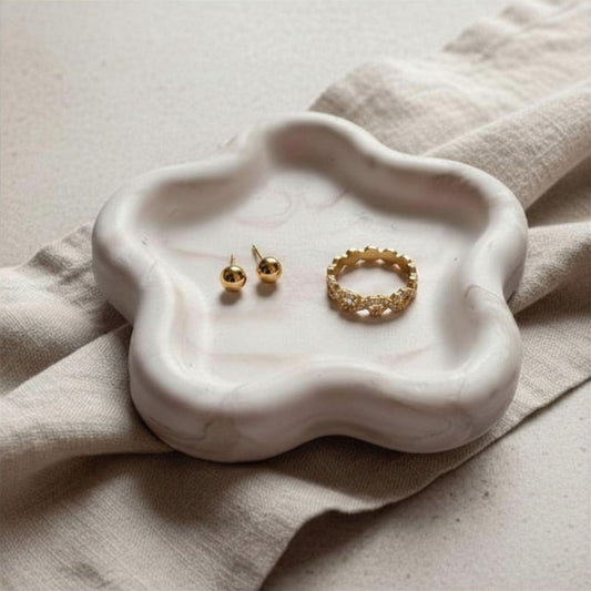 Gold Jewellery on a marble effect flower tray