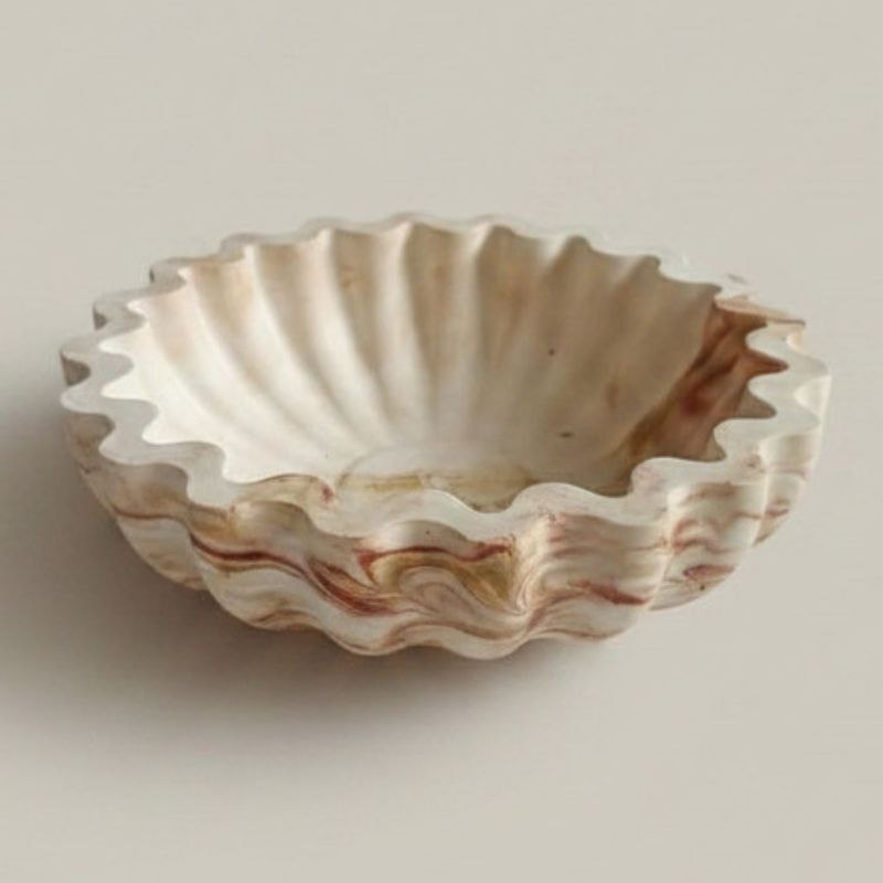 Fluted ribbed bowl with burgundy and brown marble finish