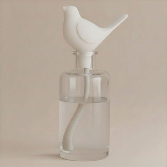 Bird Diffuser topper in a diffuser bottle