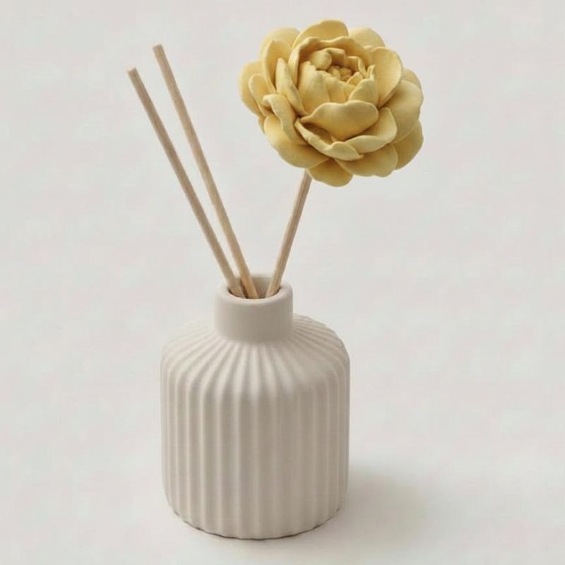 White diffuser with soft ochre peony diffuser flower and wooden sticks